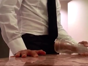Gay masturbation with a sex toy called a Fleshlight.