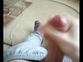 Young Russian gay masturbates and ejaculates.