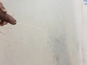 Rajeshplayboy993s bathroom scene with piss and blowjob