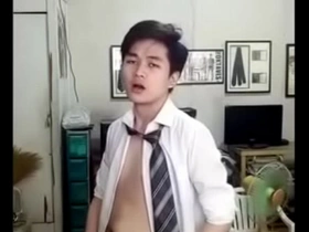 A young gay man of East Asian descent undresses and has an orgasm.