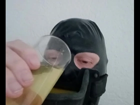 Gay BDSM scene with piss drinking and urethral gag
