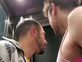 Gay elevator encounter with neighbor turns into bareback sex scene