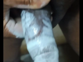 An Asian man masturbates with toothpaste.