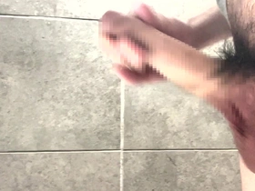 Young Japanese man masturbates with large penis