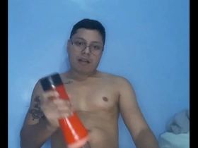 Young gay man masturbating on camera.