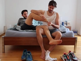 Gay men having fun with foot play, socks, and shoes