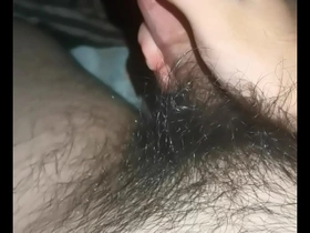 Solo Chinese man masturbates and ejaculates.