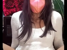 Chika, the beautiful crossdresser, masturbates while streaming.