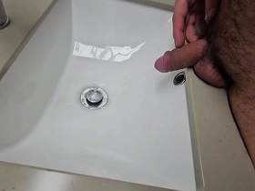 Solo gay masturbation with a kinky twist: piss play