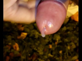 Outdoor gay masturbation with a leather cock sleeve ends up in a facial