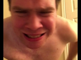 A pitiful man cries and sobs while he spanks himself.