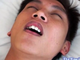 Asian doctors use sex toys on a twink in gay porn video